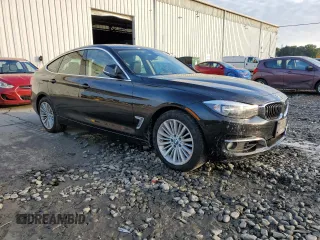 2015 BMW 3 Series GT 328i xDrive with VIN WBA8Z5C53FD672470, listed as a Copart auction lot 69278733 with 133,323 mi miles. Bid and sale history available at carsss.com. Image 4.