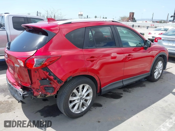 2015 Mazda CX-5 Grand Touring with VIN JM3KE2DY7F0537017, listed as a IAAI auction lot 41953011 with 78,098 mi miles. Bid and sale history available at carsss.com. Image 4.
