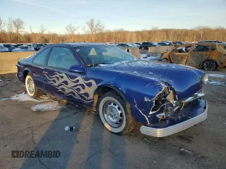 1995 Ford Thunderbird LX with VIN 1FALP62W4SH164066, listed as a Copart auction lot 86115924 with 92,990 mi miles and Salvage Title. Bid and sale history available at DreamBid. Image 4.