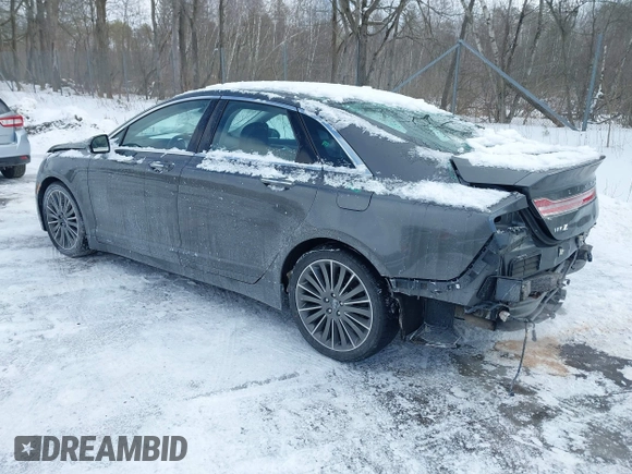 2015 Lincoln MKZ z VIN 3LN6L2J99FR606377, wystawiony jako IAAI lot #41597537 z przebiegiem 110 746 mil mil oraz . Historia ofert i sprzedaży dostępna na DreamBid. Obrazek 3.
