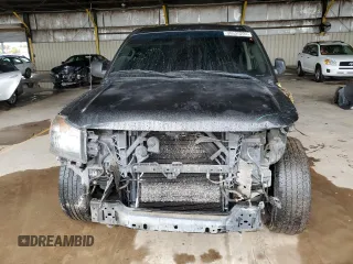 2015 Nissan Titan SL with VIN 1N6AA0ED1FN503994, listed as a Copart auction lot 39525224 with 104,353 mi miles and Salvage Title. Bid and sale history available at DreamBid. Image 5.