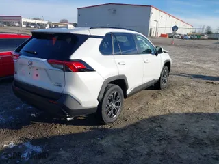 2024 Toyota RAV4 Hybrid XLE Premium with VIN JTMB6RFV3RJ045018, listed as a IAAI auction lot 41610974 with 13,765 mi miles. Bid and sale history available at carsss.com. Image 4.