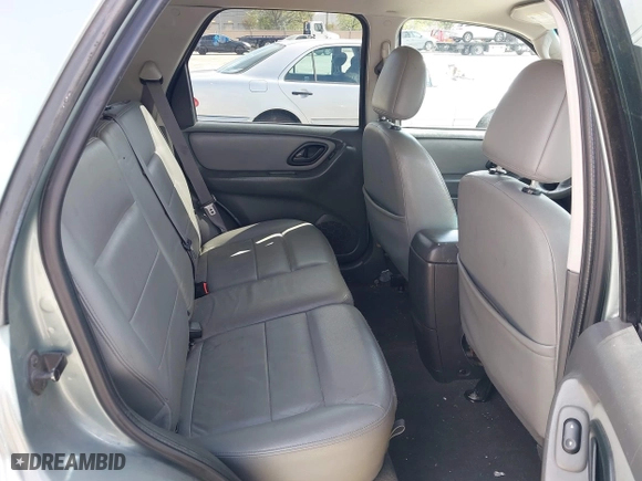 2007 Ford Escape Hybrid with VIN 1FMCU59H37KA92464, listed as a IAAI auction lot 42001479 with 159,147 mi miles. Bid and sale history available at carsss.com. Image 8.
