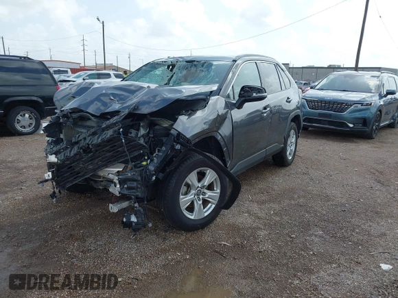 2021 Toyota RAV4 XLE with VIN 2T3W1RFV5MC104078, listed as a IAAI auction lot 42591343 with 57,057 mi miles and . Bid and sale history available at DreamBid. Image 2.