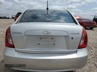 2010 Hyundai Accent GLS z VIN KMHCN4ACXAU473196, wystawiony jako Copart lot #55462405 z przebiegiem 198 235 mil mil oraz Szkoda całkowita • Salvage title. Historia ofert i sprzedaży dostępna na DreamBid. Obrazek 6.