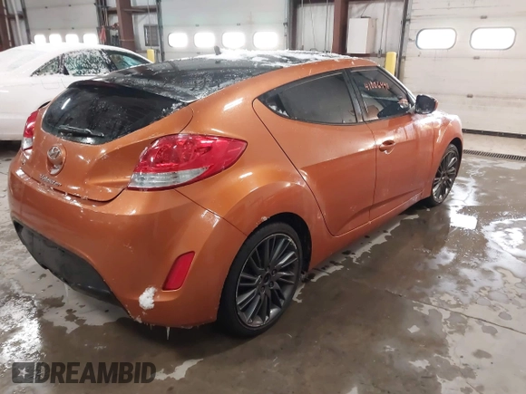 2012 Hyundai Veloster w/Gray Int z VIN KMHTC6AD6CU076954, wystawiony jako IAAI lot #41006441 z przebiegiem 73 767 mil mil oraz . Historia ofert i sprzedaży dostępna na DreamBid. Obrazek 4.