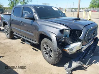2018 Toyota Tacoma SR with VIN 3TMCZ5AN3JM177067, listed as a IAAI auction lot 42277750 with 122,653 mi miles and . Bid and sale history available at DreamBid. Image 1.