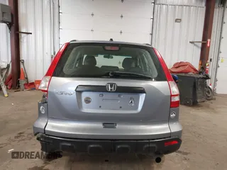 2009 Honda CR-V LX with VIN JHLRE48359C018488, listed as a IAAI auction lot 41824887 with 203,235 mi miles. Bid and sale history available at carsss.com. Image 16.