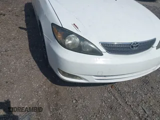 2003 Toyota Camry LE with VIN JTDBE32K830222476, listed as a IAAI auction lot 42160720 with 161,570 mi miles and . Bid and sale history available at DreamBid. Image 13.