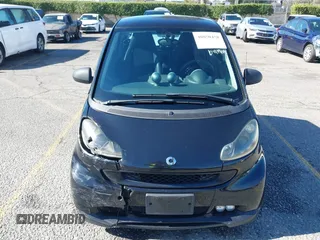 2009 Smart fortwo Pure z VIN WMEEJ31X49K218655, wystawiony jako IAAI lot #40850458 z przebiegiem 243 075 mil mil oraz . Historia ofert i sprzedaży dostępna na DreamBid. Obrazek 11.