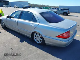 2004 Mercedes-Benz S-Class 5.0L with VIN WDBNG84J74A403779, listed as a IAAI auction lot 41346259 with 224,485 mi miles. Bid and sale history available at carsss.com. Image 3.