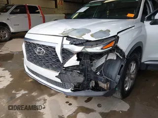 2019 Hyundai Santa Fe SE with VIN 5NMS23AD1KH063472, listed as a IAAI auction lot 41375650 with 64,496 mi miles and . Bid and sale history available at DreamBid. Image 6.
