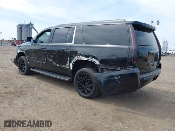 2017 Chevrolet Suburban LT with VIN 1GNSKHKCXHR194365, listed as a IAAI auction lot 42060690 with 213,424 mi miles and . Bid and sale history available at DreamBid. Image 3.