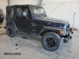 2002 Jeep Wrangler Sport with VIN 1J4FA49S82P713459, listed as a Copart auction lot 52745955 with 173,297 mi miles and Salvage Title. Bid and sale history available at carsss.com. Image 4.
