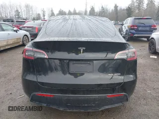 2021 Tesla Model Y Performance z VIN 5YJYGDEF2MF215938, wystawiony jako IAAI lot #41338287 z przebiegiem 63 925 mil mil oraz . Historia ofert i sprzedaży dostępna na DreamBid. Obrazek 15.