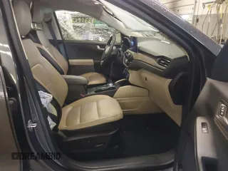 2020 Ford Escape Titanium with VIN 1FMCU9J95LUA39338, listed as a IAAI auction lot 42319122 with 34,631 mi miles and . Bid and sale history available at DreamBid. Image 5.