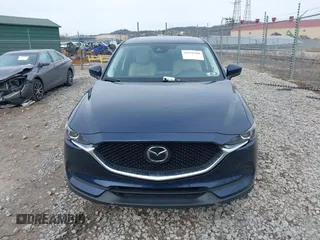 2019 Mazda CX-5 Touring with VIN JM3KFBCM5K0689948, listed as a IAAI auction lot 41976266 with 74,812 mi miles. Bid and sale history available at carsss.com. Image 12.