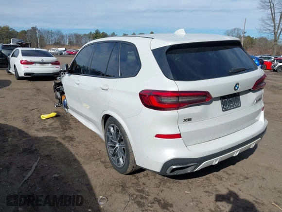 2020 BMW X5 M50i with VIN 5UXJU4C06LLE45651, listed as a IAAI auction lot 41618355 with 70,885 mi miles and . Bid and sale history available at DreamBid. Image 3.