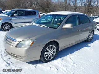 2005 Toyota Avalon XL with VIN 4T1BK36B85U051299, listed as a IAAI auction lot 41604604 with 150,325 mi miles. Bid and sale history available at carsss.com. Image 6.