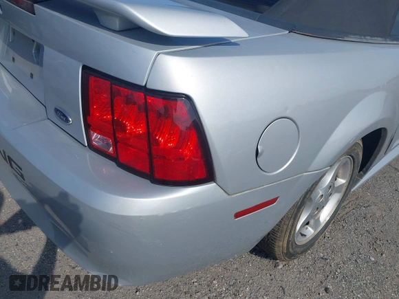2002 Ford Mustang Deluxe with VIN 1FAFP44432F205991, listed as a IAAI auction lot 42144709 with 138,119 mi miles and . Bid and sale history available at DreamBid. Image 15.