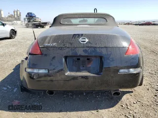 2004 Nissan 350Z Touring with VIN JN1AZ36A74T002301, listed as a Copart auction lot 61720524 with 101,779 mi miles and Salvage Title. Bid and sale history available at carsss.com. Image 6.