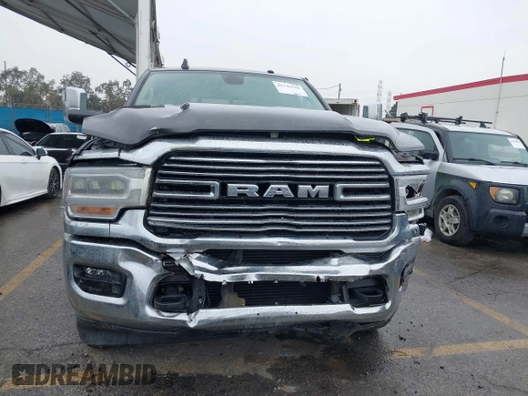 2022 Ram 2500 Laramie z VIN 3C6UR5FL2NG243857, wystawiony jako IAAI lot #41736144 z przebiegiem 58 474 mil mil oraz . Historia ofert i sprzedaży dostępna na DreamBid. Obrazek 12.