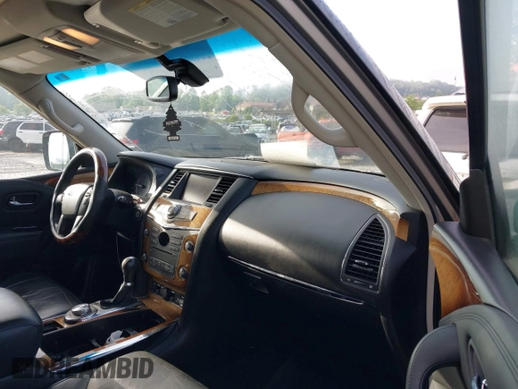 2012 Infiniti QX56 7-passenger z VIN JN8AZ2NE1C9020708, wystawiony jako IAAI lot #42128814 z przebiegiem 173 403 mil mil oraz . Historia ofert i sprzedaży dostępna na DreamBid. Obrazek 5.