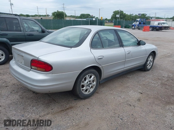 2002 Oldsmobile Intrigue GX z VIN 1G3WH52H22F149397, wystawiony jako IAAI lot #42265108 z przebiegiem 107 834 mil mil oraz . Historia ofert i sprzedaży dostępna na DreamBid. Obrazek 4.