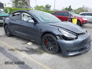 2023 Tesla Model 3 Performance z VIN 5YJ3E1EC7PF420907, wystawiony jako IAAI lot #42170806 z przebiegiem Nie podano mil oraz . Historia ofert i sprzedaży dostępna na DreamBid. Obrazek 1.