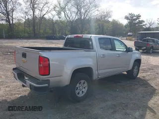 2019 Chevrolet Colorado 2WD Work Truck with VIN 1GCGSBEN3K1164686, listed as a IAAI auction lot 41943796 with 65,000 mi miles and . Bid and sale history available at DreamBid. Image 4.