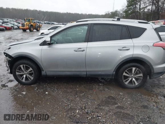 2018 Toyota RAV4 XLE with VIN 2T3RFREV2JW717351, listed as a IAAI auction lot 41576522 with 147,116 mi miles. Bid and sale history available at carsss.com. Image 14.