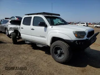 2014 Toyota Tacoma with VIN 3TMLU4EN7EM144839, listed as a Copart auction lot 52728065 with 32,610 mi miles and Salvage Title. Bid and sale history available at DreamBid. Image 4.