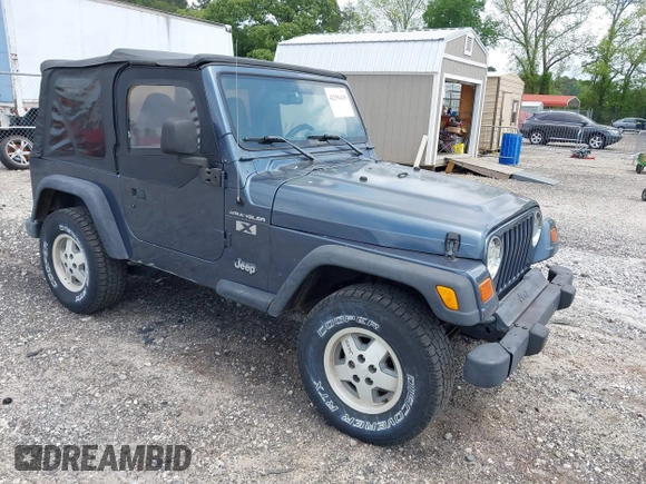 2002 Jeep Wrangler X with VIN 1J4FA39S92P736825, listed as a IAAI auction lot 42156410 with 196,313 mi miles. Bid and sale history available at carsss.com. Image 1.