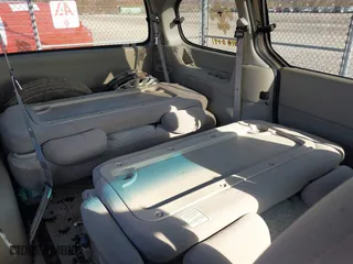 1999 Nissan Quest GXE with VIN 4N2XN11T6XD830660, listed as a IAAI auction lot 41508574 with 146,803 mi miles. Bid and sale history available at carsss.com. Image 8.