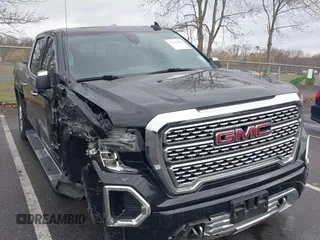 2021 GMC Sierra 1500 Denali z VIN 3GTU9FEL3MG387075, wystawiony jako IAAI lot #41922600 z przebiegiem 75 579 mil mil oraz . Historia ofert i sprzedaży dostępna na DreamBid. Obrazek 1.