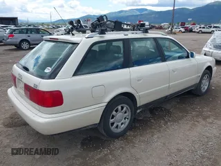 1996 Audi A6 z VIN WAUJA84A9TN106938, wystawiony jako IAAI lot #42287751 z przebiegiem 163 427 mil mil oraz . Historia ofert i sprzedaży dostępna na DreamBid. Obrazek 4.