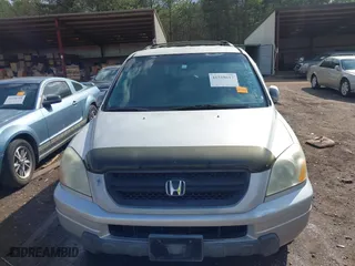 2003 Honda Pilot EX with VIN 2HKYF18693H591369, listed as a IAAI auction lot 41518617 with 325,658 mi miles. Bid and sale history available at carsss.com. Image 6.