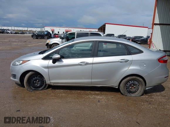 2018 Ford Fiesta S with VIN 3FADP4AJ9JM130410, listed as a IAAI auction lot 42113203 with 46,411 mi miles and . Bid and sale history available at DreamBid. Image 14.