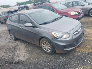 2014 Hyundai Accent GS with VIN KMHCT5AEXEU146722, listed as a IAAI auction lot 42752360 with 134,472 mi miles and . Bid and sale history available at DreamBid. Image 1.