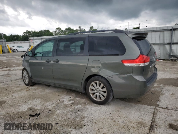 2011 Toyota Sienna XLE AAS with VIN 5TDYK3DC9BS120799, listed as a Copart auction lot 61470045 with 194,422 mi miles and Salvage title. Bid and sale history available at DreamBid. Image 2.