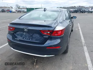 2022 Honda Insight Touring with VIN 19XZE4F90NE007552, listed as a IAAI auction lot 42038471 with 7,904 mi miles and . Bid and sale history available at carsss.com. Image 4.