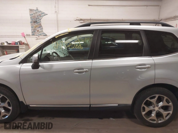 2015 Subaru Forester Touring with VIN JF2SJAWC3FH491026, listed as a IAAI auction lot 41977066 with 179,016 mi miles and . Bid and sale history available at DreamBid. Image 13.