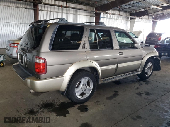 2001 Infiniti QX4 with VIN JNRDR09X21W204448, listed as a Copart auction lot 82619574 with 114,520 mi miles and Salvage Title. Bid and sale history available at DreamBid. Image 3.