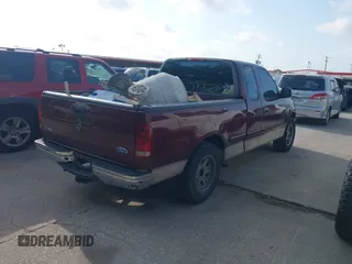 1997 Ford F-150 with VIN 1FTDX17W0VNC29902, listed as a IAAI auction lot 42556233 with 294,730 mi miles and . Bid and sale history available at DreamBid. Image 4.