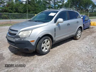 2014 Chevrolet Captiva Sport LS z VIN 3GNAL2EK1ES619408, wystawiony jako IAAI lot #42353917 z przebiegiem 166 746 mil mil oraz . Historia ofert i sprzedaży dostępna na DreamBid. Obrazek 2.