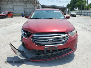 2014 Ford Taurus SEL z VIN 1FAHP2E83EG153033, wystawiony jako Copart lot #55400835 z przebiegiem 96 612 mil mil oraz Szkoda całkowita • Salvage title. Historia ofert i sprzedaży dostępna na DreamBid. Obrazek 5.