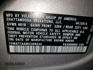 2014 Volkswagen Passat Wolfsburg Edition with VIN 1VWAT7A30EC096244, listed as a Copart auction lot 54097505 with 153,321 mi miles and Salvage title. Bid and sale history available at DreamBid. Image 12.