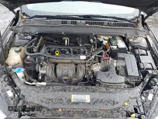 2016 Ford Fusion S z VIN 3FA6P0G70GR255496, wystawiony jako IAAI lot #42645878 z przebiegiem 198 899 mil mil oraz . Historia ofert i sprzedaży dostępna na DreamBid. Obrazek 10.