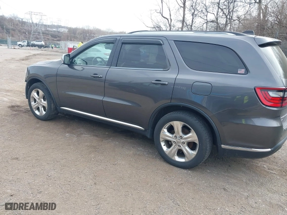 2014 Dodge Durango Limited with VIN 1C4SDJDTXEC345520, listed as a IAAI auction lot 41406601 with 148,216 mi miles. Bid and sale history available at carsss.com. Image 3.