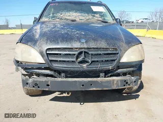 2001 Mercedes-Benz M-Class with VIN 4JGAB54E91A288934, listed as a IAAI auction lot 41714337 with 236,115 mi miles. Bid and sale history available at carsss.com. Image 6.